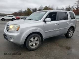 2011 Honda Pilot EX-L z VIN 5FNYF4H58BB106824, wystawiony jako Copart lot #90622145 z przebiegiem 163 820 mil mil oraz Szkoda całkowita • Salvage title. Historia ofert i sprzedaży dostępna na DreamBid. Obrazek 1.