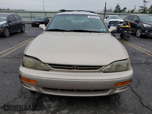 1996 Toyota Camry LE with VIN 4T1EF12K0TU140325, listed as a Copart auction lot 56695655 with 190,447 mi miles and Salvage title. Bid and sale history available at DreamBid. Image 5.