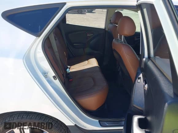 2014 Hyundai Tucson SE with VIN KM8JU3AG8EU829819, listed as a IAAI auction lot 41702183 with 90,791 mi miles and . Bid and sale history available at DreamBid. Image 8.