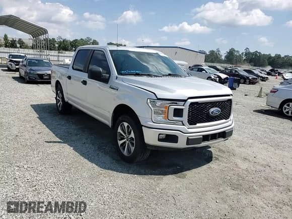 2019 Ford F-150 XLT с VIN 1FTEW1CPXKKC81900, выставлен на аукционе Copart как лот 71236885 с пробегом 101 320 миль миль и Списание • Salvage title. История ставок и продаж доступна на DreamBid. Изображение 13.