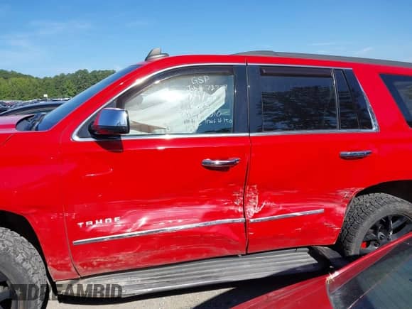 2019 Chevrolet Tahoe LS with VIN 1GNSKAKC1KR197010, listed as a IAAI auction lot 42718151 with 117,781 mi miles and . Bid and sale history available at DreamBid. Image 14.