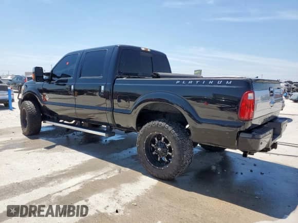2014 Ford F-250 XL z VIN 1FT7W2BT7EEB32621, wystawiony jako Copart lot #69217615 z przebiegiem 100 710 mil mil oraz Czysty tytuł • Clean title. Historia ofert i sprzedaży dostępna na DreamBid. Obrazek 2.