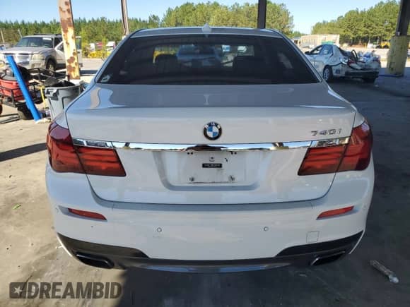 2014 BMW 7 Series 740i с VIN WBAYA6C59ED144122, выставлен на аукционе Copart как лот 75059334 с пробегом 78 090 миль миль и Списание • Salvage title. История ставок и продаж доступна на DreamBid. Изображение 6.