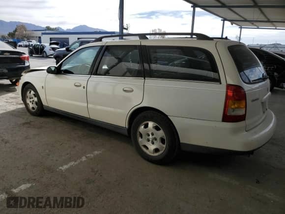 2002 Saturn LW with VIN 1G8JW84R02Y519686, listed as a Copart auction lot 86702484 with 111,819 mi miles and Salvage title. Bid and sale history available at DreamBid. Image 2.