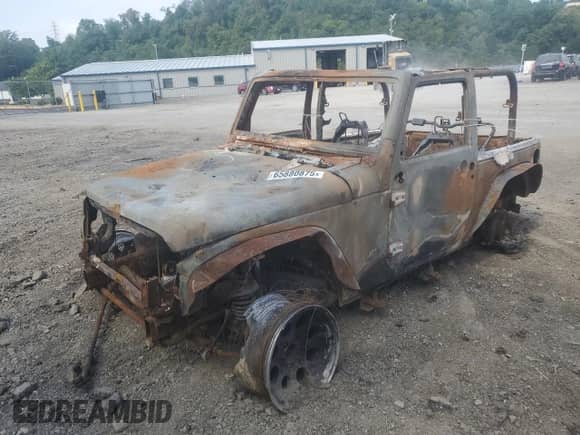 2014 Jeep Wrangler Sahara z VIN 1C4AJWBG6EL168763, wystawiony jako Copart lot #65880875 z przebiegiem Nie podano mil oraz Szkoda całkowita • Salvage title. Historia ofert i sprzedaży dostępna na DreamBid. Obrazek 1.