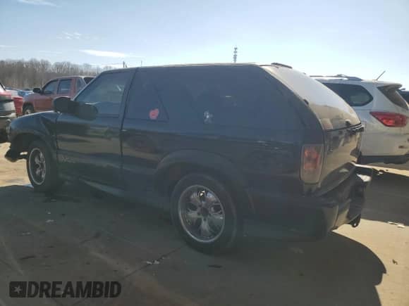 2003 Chevrolet Blazer Xtreme with VIN 1GNCS18X23K107727, listed as a Copart auction lot 45859075 with 233,270 mi miles and Salvage title. Bid and sale history available at DreamBid. Image 2.