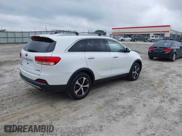 2016 Kia Sorento EX with VIN 5XYPH4A14GG029348, listed as a IAAI auction lot 42955283 with 129,831 mi miles and . Bid and sale history available at DreamBid. Image 4.