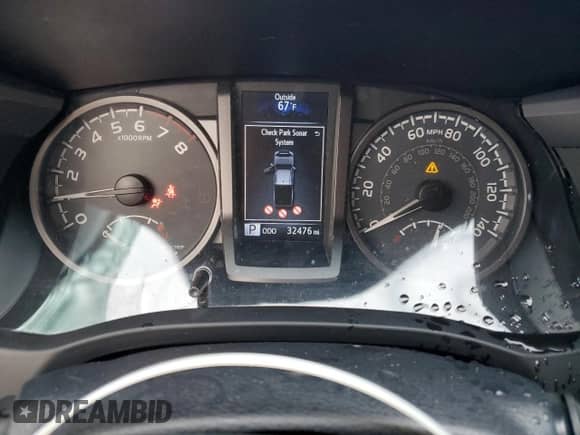 2019 Toyota Tacoma SR5 z VIN 5TFSZ5AN7KX184658, wystawiony jako Copart lot #71963065 z przebiegiem 32 476 mil mil oraz Szkoda całkowita • Salvage title. Historia ofert i sprzedaży dostępna na DreamBid. Obrazek 9.