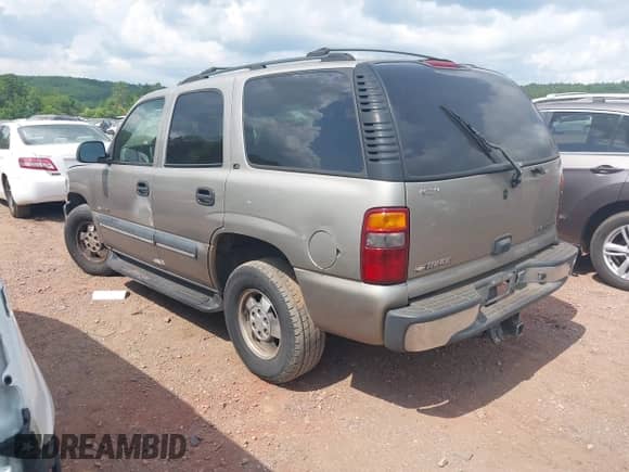2002 Chevrolet Tahoe LS with VIN 1GNEC13Z52R275513, listed as a IAAI auction lot 42490320 with 254,888 mi miles and . Bid and sale history available at DreamBid. Image 3.