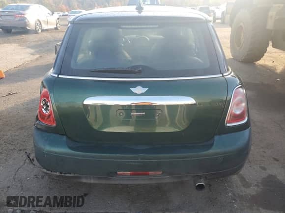 2011 MINI Hardtop with VIN WMWSU3C59BT253726, listed as a Copart auction lot 87220845 with 123,389 mi miles and Salvage title. Bid and sale history available at DreamBid. Image 6.