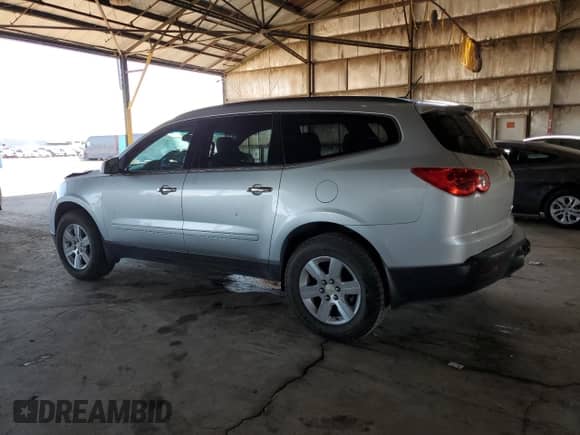 2011 Chevrolet Traverse 2LT with VIN 1GNKRJED5BJ169757, listed as a Copart auction lot 84573965 with 122,514 mi miles and Salvage title. Bid and sale history available at DreamBid. Image 2.