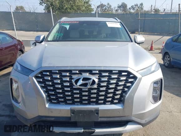 2021 Hyundai Palisade SEL with VIN KM8R44HEXMU305261, listed as a IAAI auction lot 42956509 with 79,930 mi miles and . Bid and sale history available at DreamBid. Image 12.