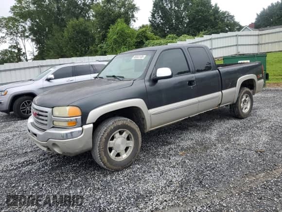 2004 GMC Sierra 1500 SLT z VIN 1GTEK19T14Z146489, wystawiony jako Copart lot #66932135 z przebiegiem 332 391 mil mil oraz Szkoda całkowita • Salvage title. Historia ofert i sprzedaży dostępna na DreamBid. Obrazek 1.