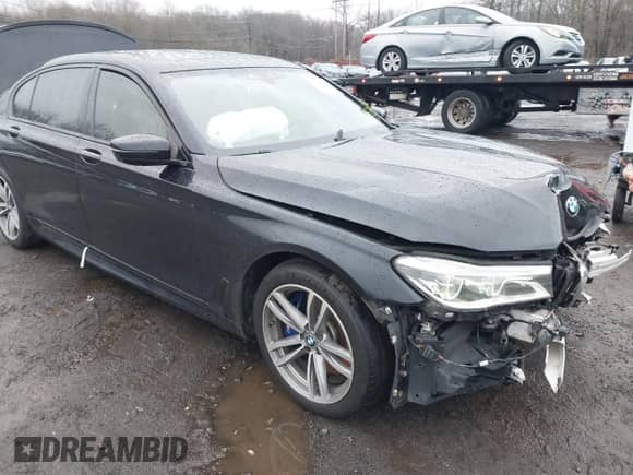 2019 BMW 7 Series 750i xDrive z VIN WBA7F2C56KB240271, wystawiony jako IAAI lot #41111776 z przebiegiem 76 875 mil mil oraz . Historia ofert i sprzedaży dostępna na DreamBid. Obrazek 17.