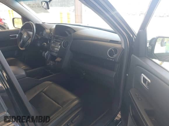 2012 Honda Pilot Touring with VIN 5FNYF4H99CB075099, listed as a IAAI auction lot 42674383 with 203,684 mi miles and . Bid and sale history available at DreamBid. Image 5.