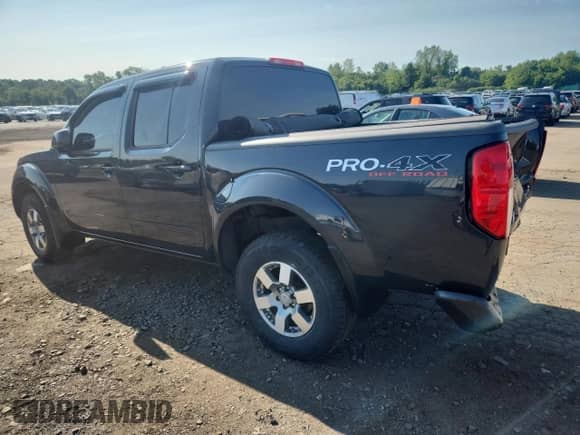 2010 Nissan Frontier Pro-4X z VIN 1N6AD0EV7AC437763, wystawiony jako Copart lot #66898325 z przebiegiem 134 351 mil mil oraz Szkoda całkowita • Salvage title. Historia ofert i sprzedaży dostępna na DreamBid. Obrazek 2.