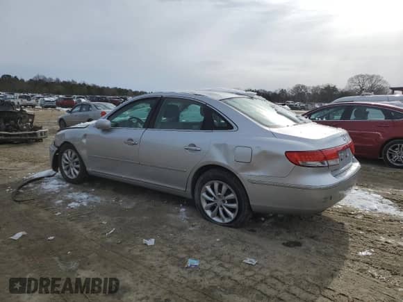 2007 Hyundai Azera SE z VIN KMHFC46F47A188591, wystawiony jako Copart lot #87225494 z przebiegiem 86 047 mil mil oraz Szkoda całkowita • Salvage title. Historia ofert i sprzedaży dostępna na DreamBid. Obrazek 2.