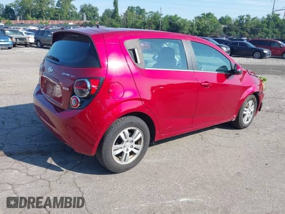 2013 Chevrolet Sonic LT with VIN 1G1JC6SBXD4249992, listed as a IAAI auction lot 42667093 with 53,007 mi miles and . Bid and sale history available at DreamBid. Image 4.