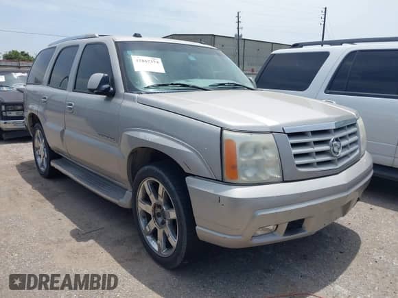2005 Cadillac Escalade z VIN 1GYEK63N25R248175, wystawiony jako IAAI lot #42867374 z przebiegiem 185 101 mil mil oraz . Historia ofert i sprzedaży dostępna na DreamBid. Obrazek 1.