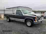 1997 Chevrolet Silverado 1500 with VIN 1GCEC14R2VZ231710, listed as a Copart auction lot 51452965 with 263,678 mi miles and Salvage title. Bid and sale history available at DreamBid. Image 4.