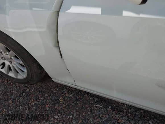 2014 Chrysler 300 S with VIN 2C3CCABG0EH330345, listed as a IAAI auction lot 42164999 with 167,627 mi miles and . Bid and sale history available at DreamBid. Image 20.