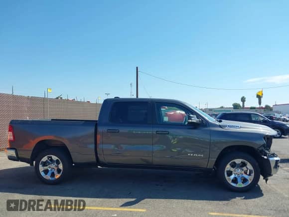 2022 Ram 1500 Big Horn z VIN 1C6RREMT4NN398555, wystawiony jako IAAI lot #43294246 z przebiegiem 21 094 mil mil oraz . Historia ofert i sprzedaży dostępna na DreamBid. Obrazek 13.