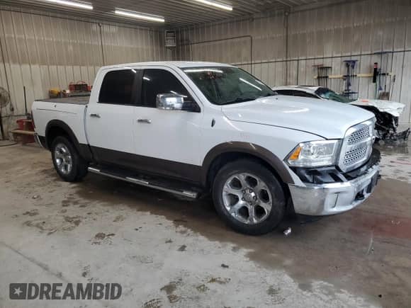 2017 Ram 1500 Laramie with VIN 1C6RR6NT7HS781965, listed as a Copart auction lot 56574875 with 130,209 mi miles and Salvage title. Bid and sale history available at DreamBid. Image 4.