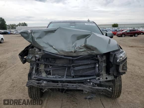 2023 Chevrolet Suburban LT with VIN 1GNSKCKD2PR164058, listed as a Copart auction lot 70387065 with 58,551 mi miles and Salvage title. Bid and sale history available at DreamBid. Image 5.