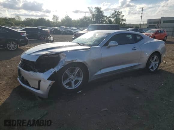 2019 Chevrolet Camaro 1LT with VIN 1G1FB1RS8K0121580, listed as a Copart auction lot 84939975 with 87,397 mi miles and Salvage title. Bid and sale history available at DreamBid. Image 1.
