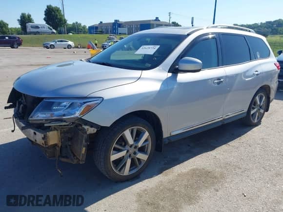2015 Nissan Pathfinder Platinum with VIN 5N1AR2MMXFC613832, listed as a IAAI auction lot 42628734 with 182,941 mi miles and . Bid and sale history available at DreamBid. Image 2.