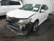 2014 Toyota Camry L with VIN 4T1BF1FK5EU306533, listed as a IAAI auction lot 42734290 with 169,536 mi miles and . Bid and sale history available at DreamBid. Image 2.