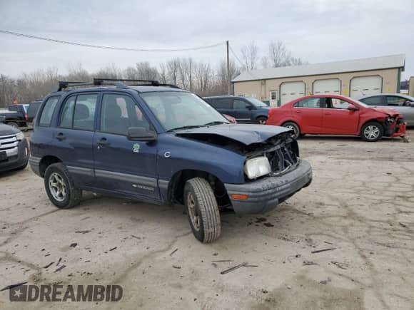2000 Chevrolet Tracker with VIN 2CNBJ13C0Y6917889, listed as a Copart auction lot 42703105 with Not provided miles and Salvage title. Bid and sale history available at DreamBid. Image 4.