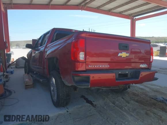 2018 Chevrolet Silverado 1500 High Country with VIN 3GCPCTEC2JG615429, listed as a IAAI auction lot 41855416 with Not provided miles and . Bid and sale history available at DreamBid. Image 3.