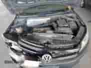 2014 Volkswagen Tiguan S z VIN WVGAV3AX8EW556155, wystawiony jako Copart lot #67572205 z przebiegiem 151 963 mil mil oraz Szkoda całkowita • Salvage title. Historia ofert i sprzedaży dostępna na DreamBid. Obrazek 12.