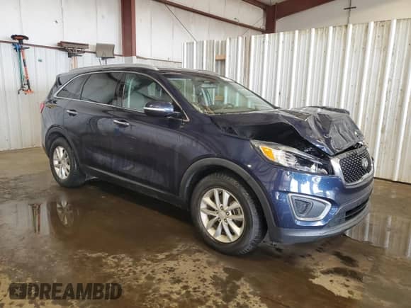 2016 Kia Sorento LX with VIN 5XYPG4A36GG166117, listed as a Copart auction lot 90223665 with 101,896 mi miles and Salvage title. Bid and sale history available at DreamBid. Image 4.