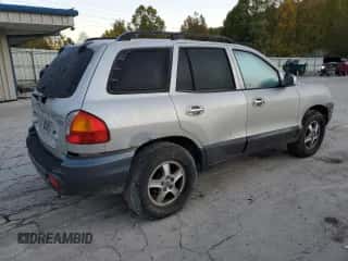 2003 Hyundai Santa Fe LX с VIN KM8SC73E63U536654, выставлен на аукционе Copart как лот 76224694 с пробегом 191 977 миль миль и Списание • Salvage title. История ставок и продаж доступна на DreamBid. Изображение 3.