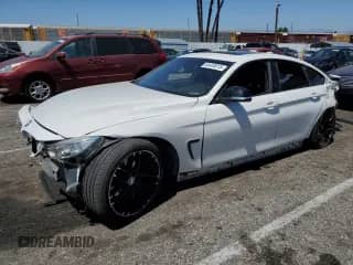 2015 BMW 4 Series 428i z VIN WBA4A5C59FGK15411, wystawiony jako Copart lot #64403615 z przebiegiem 108 660 mil mil oraz Szkoda całkowita • Salvage title. Historia ofert i sprzedaży dostępna na DreamBid. Obrazek 1.