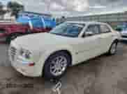 2006 Chrysler 300 C with VIN 2C3KA63H36H535584, listed as a Copart auction lot 82447975 with 54,428 mi miles and Salvage title. Bid and sale history available at DreamBid. Image 1.