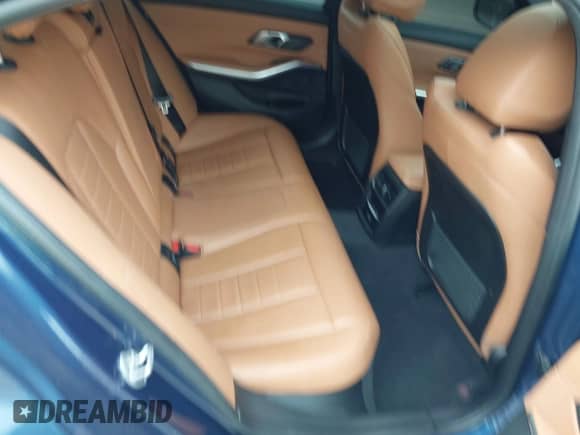 2021 BMW 3 Series 330i с VIN 3MW5R1J09M8B86677, выставлен на аукционе IAAI как лот 43432487 с пробегом 74 515 миль миль и . История ставок и продаж доступна на DreamBid. Изображение 8.