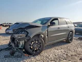 2021 Dodge Durango R/T with VIN 1C4SDJCTXMC762877, listed as a Copart auction lot 68033645 with 100,534 mi miles and Salvage title. Bid and sale history available at DreamBid. Image 1.