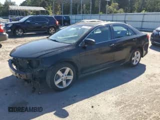 2014 Toyota Camry SE с VIN 4T1BF1FK9EU406330, выставлен на аукционе Copart как лот 86137295 с пробегом 83 819 миль миль и Списание • Salvage title. История ставок и продаж доступна на DreamBid. Изображение 1.