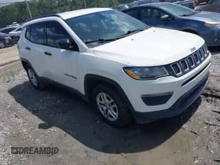 2018 Jeep Compass Sport with VIN 3C4NJCABXJT411852, listed as a IAAI auction lot 42744199 with 157,850 mi miles and . Bid and sale history available at DreamBid. Image 1.