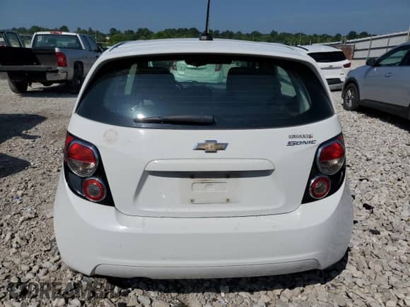 2016 Chevrolet Sonic LS с VIN 1G1JA6SG6G4171474, выставлен на аукционе Copart как лот 63087675 с пробегом 115 823 миль миль и Списание • Salvage title. История ставок и продаж доступна на DreamBid. Изображение 6.