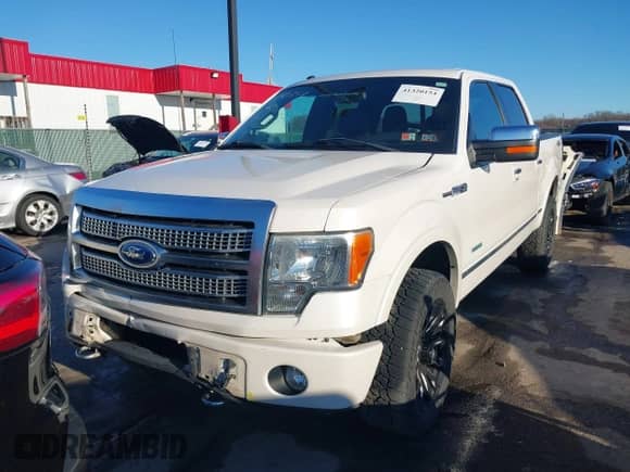 2011 Ford F-150 XLT z VIN 1FTFW1ETXBFB21698, wystawiony jako IAAI lot #41320154 z przebiegiem 119 765 mil mil oraz . Historia ofert i sprzedaży dostępna na DreamBid. Obrazek 12.