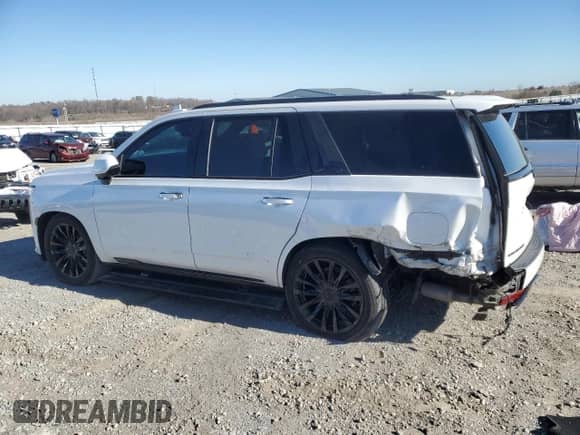 2022 Cadillac Escalade Premium Luxury с VIN 1GYS4CKL9NR154953, выставлен на аукционе Copart как лот 83537254 с пробегом 77 397 миль миль и Списание • Salvage title. История ставок и продаж доступна на DreamBid. Изображение 2.