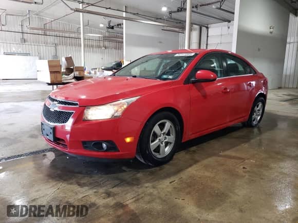2014 Chevrolet Cruze 1LT с VIN 1G1PD5SB9E7443253, выставлен на аукционе Copart как лот 54141085 с пробегом 74 851 миль миль и Списание • Salvage title. История ставок и продаж доступна на DreamBid. Изображение 1.