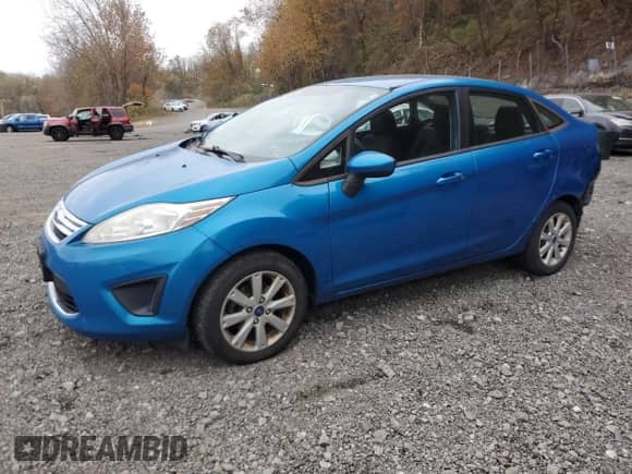 2012 Ford Fiesta SE with VIN 3FADP4BJ6CM155573, listed as a Copart auction lot 89729035 with 93,216 mi miles and Salvage title. Bid and sale history available at DreamBid. Image 1.