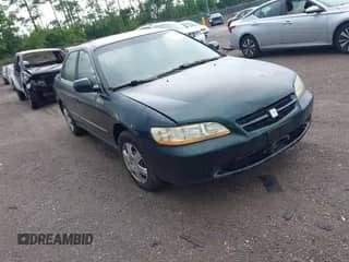 1999 Honda Accord LX with VIN 1HGCG1643XA054276, listed as a IAAI auction lot 42311375 with 115,784 mi miles and . Bid and sale history available at DreamBid. Image 1.