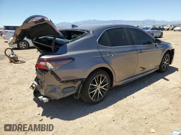 2023 Toyota Camry SE z VIN 4T1G11AK9PU155758, wystawiony jako Copart lot #42059185 z przebiegiem 18 622 mil mil oraz Czysty tytuł • Clean title. Historia ofert i sprzedaży dostępna na DreamBid. Obrazek 3.