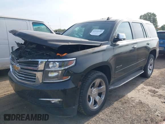 2015 Chevrolet Tahoe LTZ with VIN 1GNSKCKC1FR161948, listed as a IAAI auction lot 43222142 with Not provided miles and . Bid and sale history available at DreamBid. Image 2.